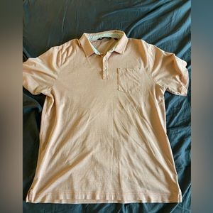 Men’s Travis Matthews golf polo.